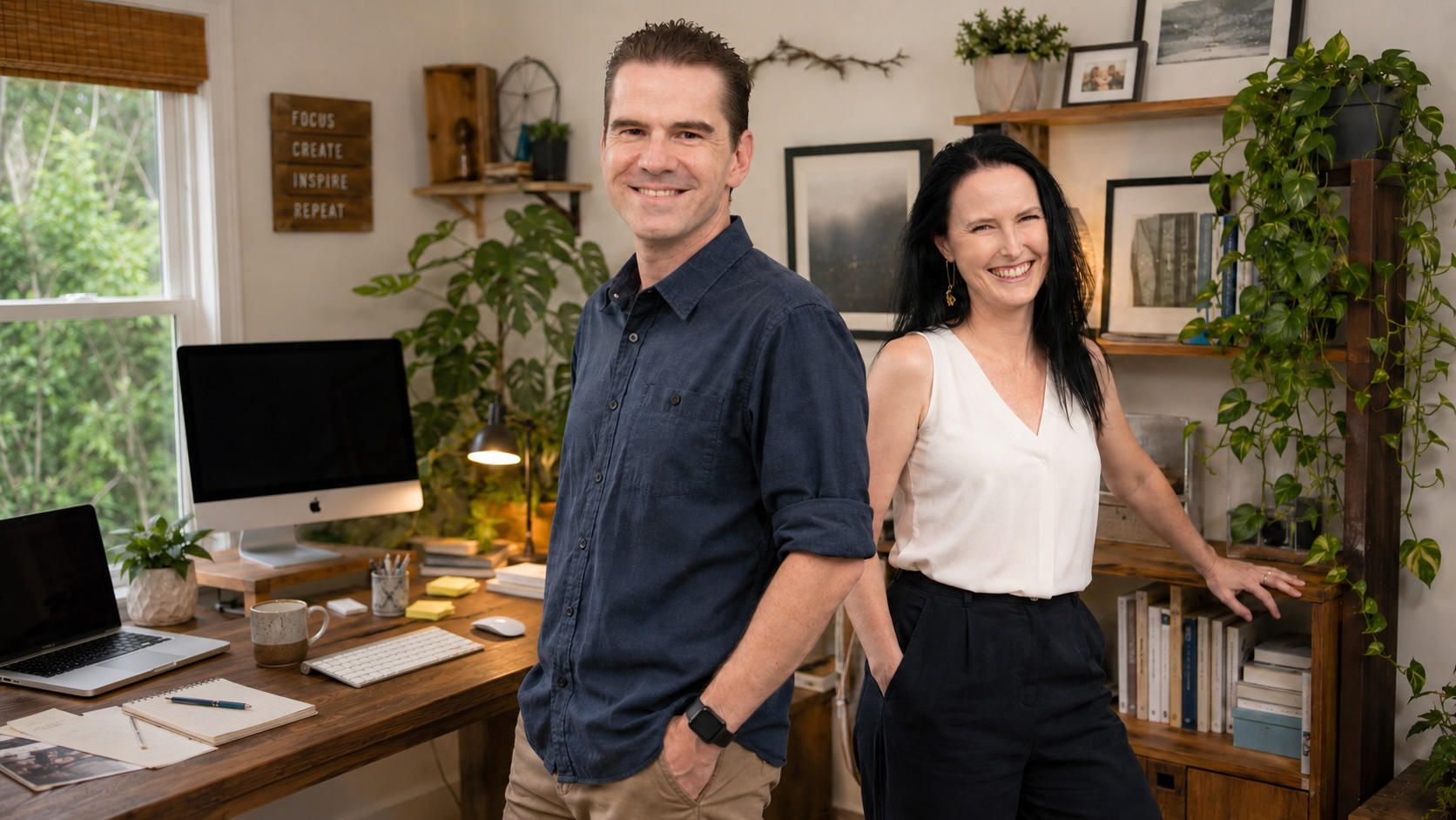 Dale and Dawn standing in their home office, smiling to camera.